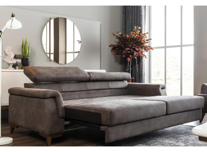 Γκρι καναπές για τρία άτομα με δυνατότητα κρεβατιού