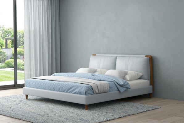 Moderne Doppelbett 180x200 in weißem Lederdesign auf Holzbeinen