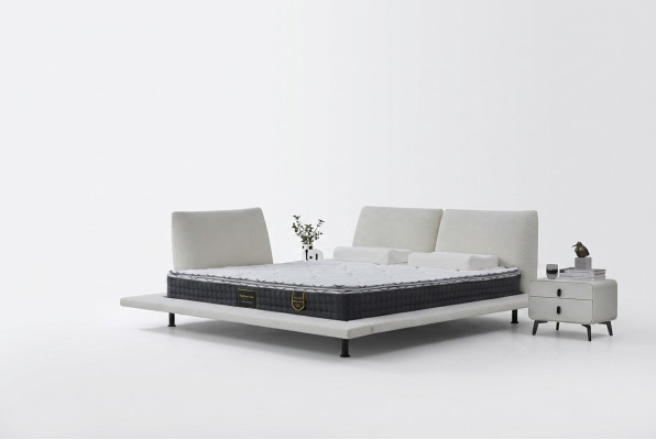 Μοντέρνο κρεβάτι boxspring με λευκό μινιμαλιστικό κεφαλάρι