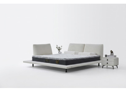 Μοντέρνο κρεβάτι boxspring με λευκό μινιμαλιστικό κεφαλάρι